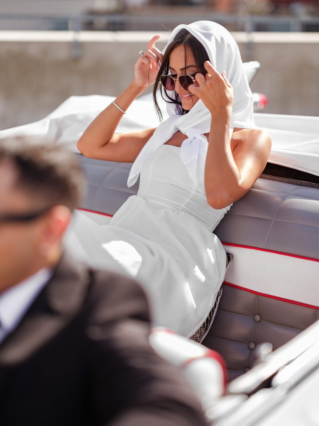 Engagement portrait with a classic car