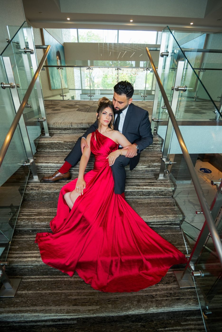 Engagement portrait on a luxury hotel staircase