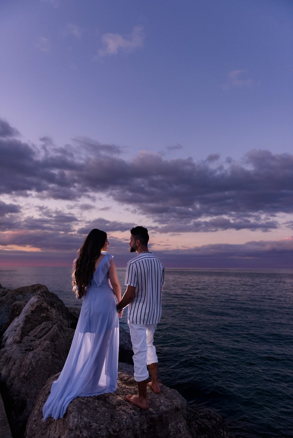 Couple on the rocks above Lake Michigan