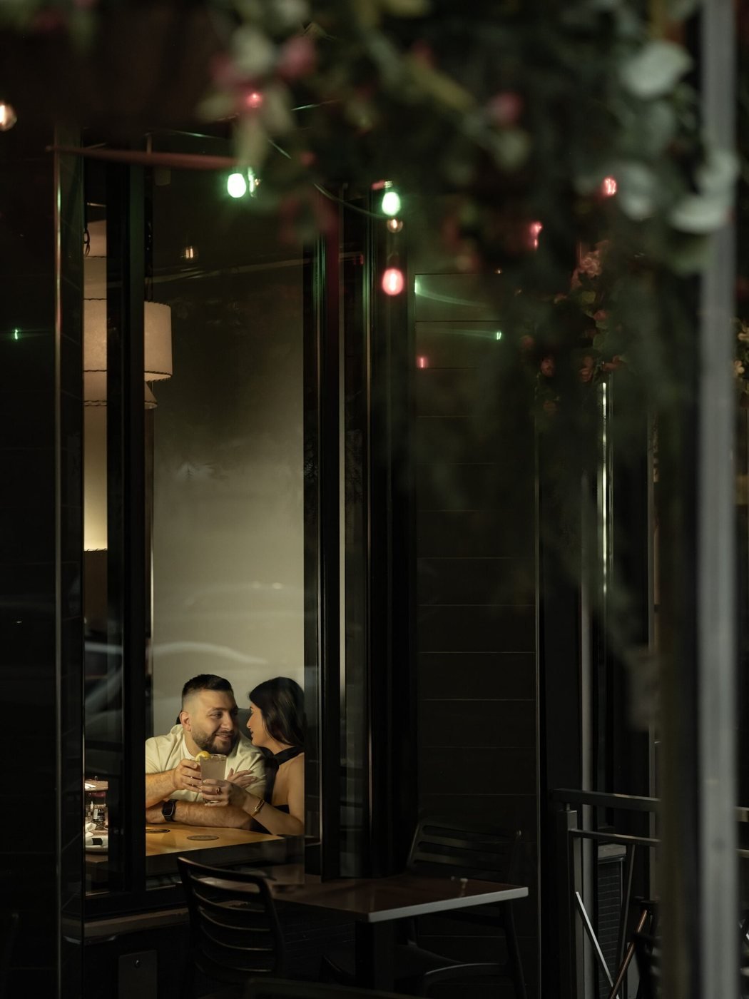 Couple framed in a restaurant window