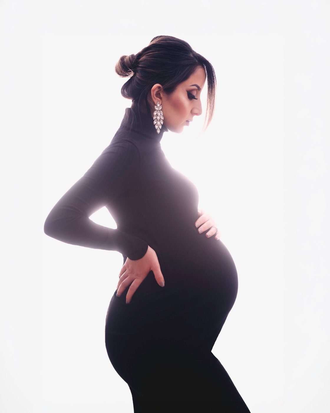 Maternity silhouette on a high-key background