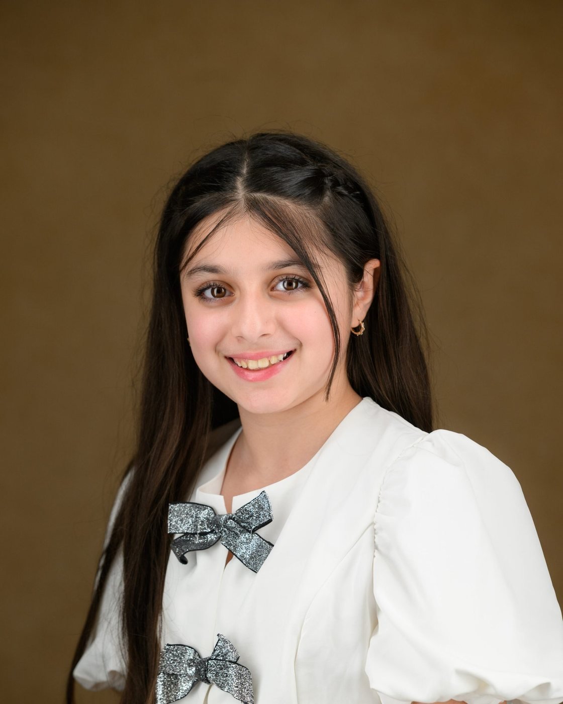 School portrait on a classic painted backdrop