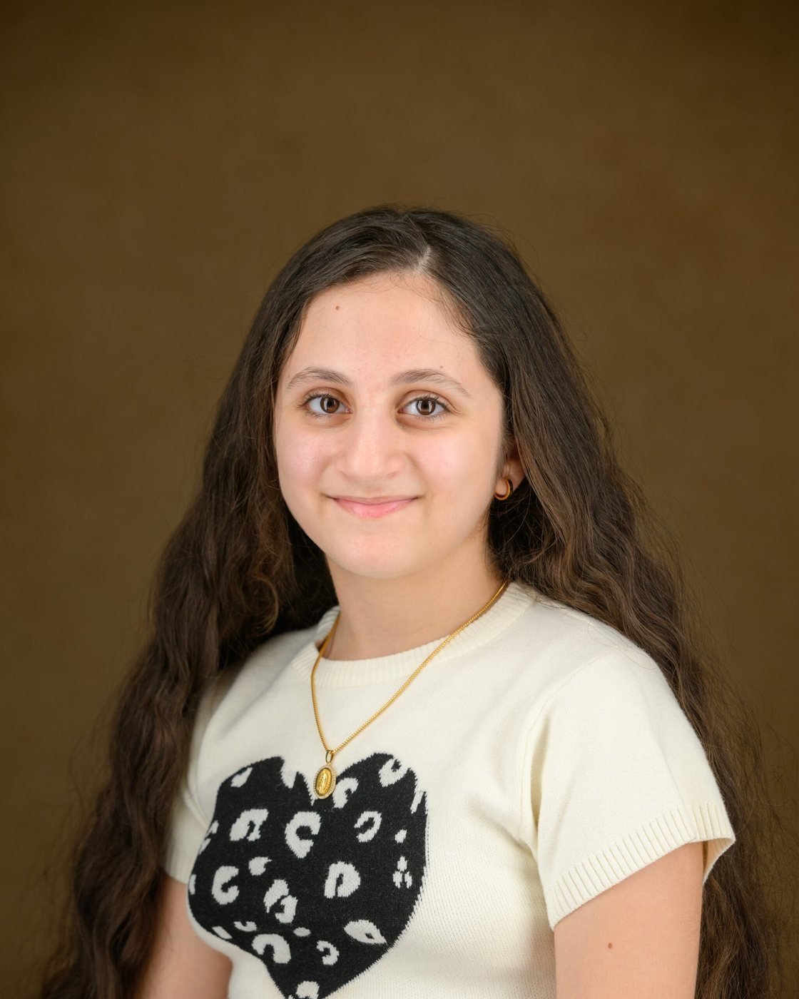 School portrait on a classic painted backdrop