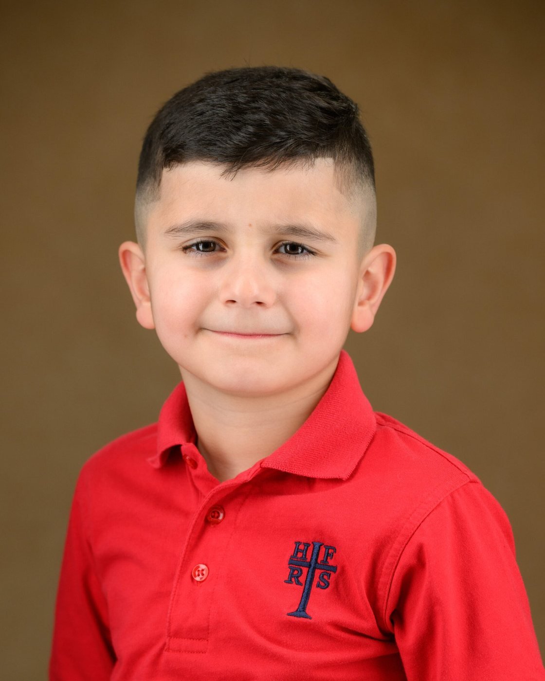 School portrait on a classic painted backdrop