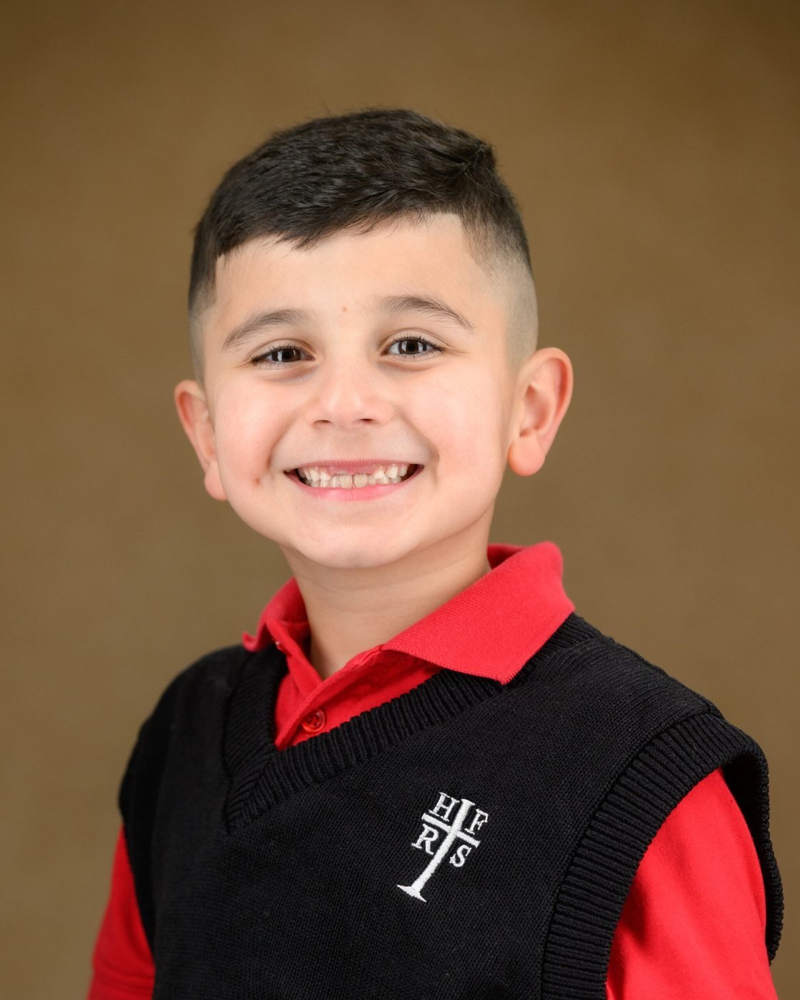 School portrait on a classic painted backdrop