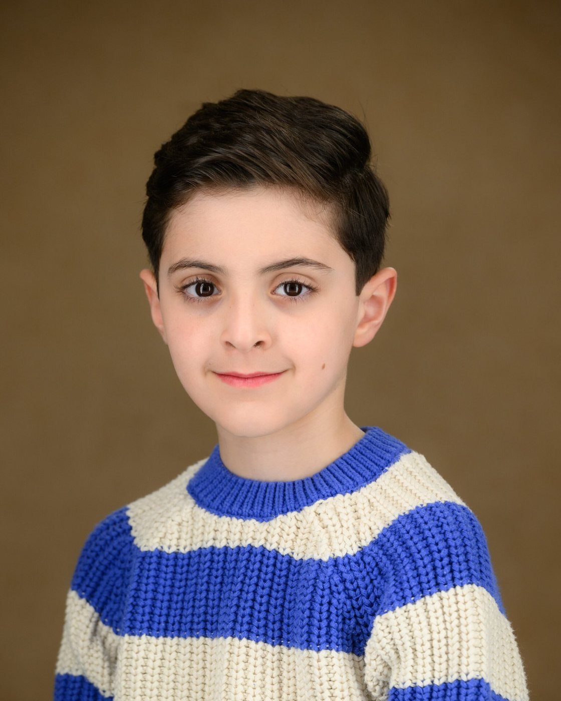 School portrait on a classic painted backdrop