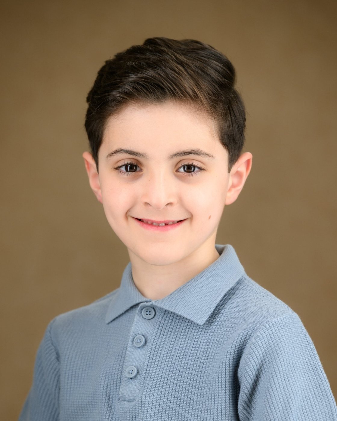 School portrait on a classic painted backdrop
