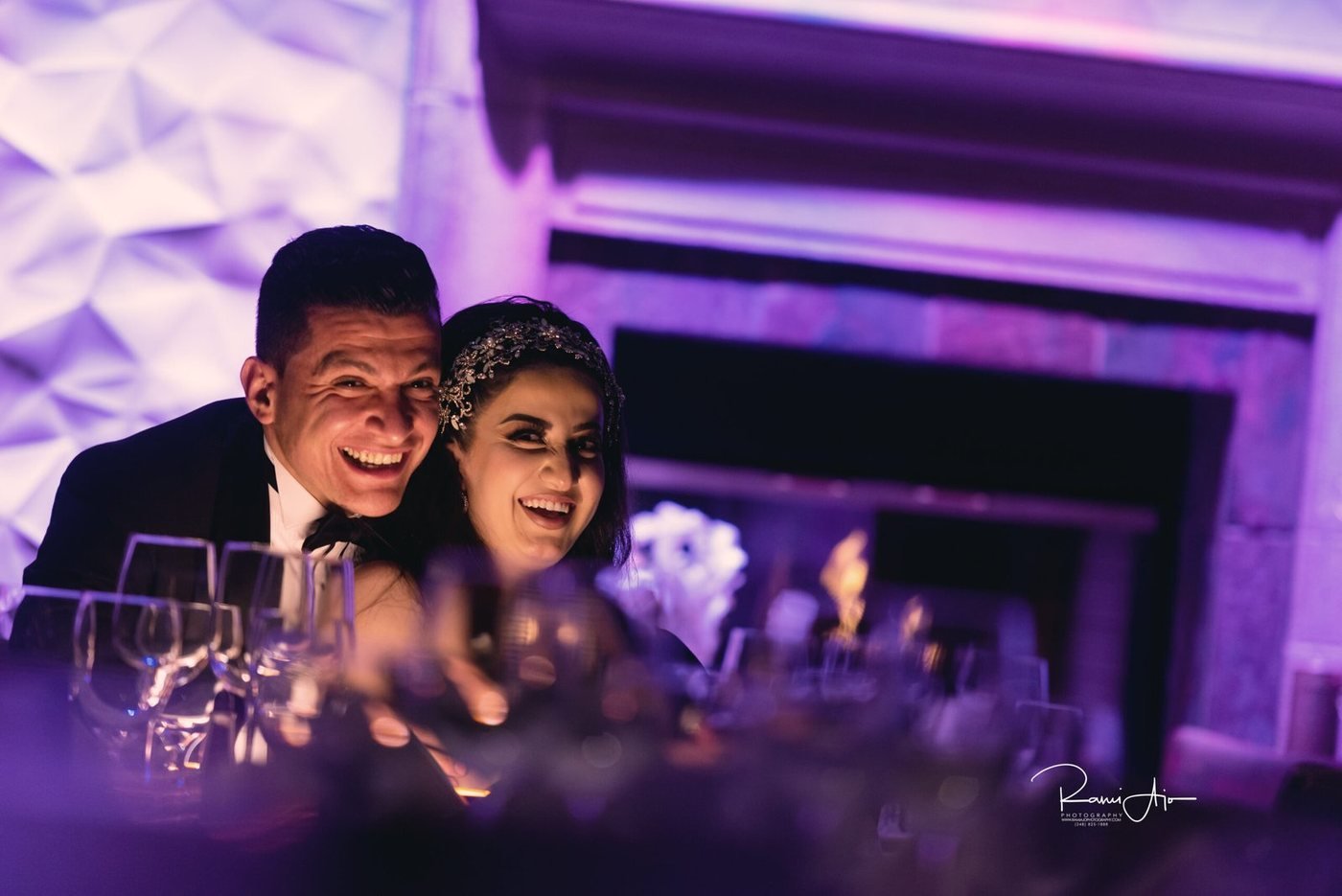Reception celebration under violet light